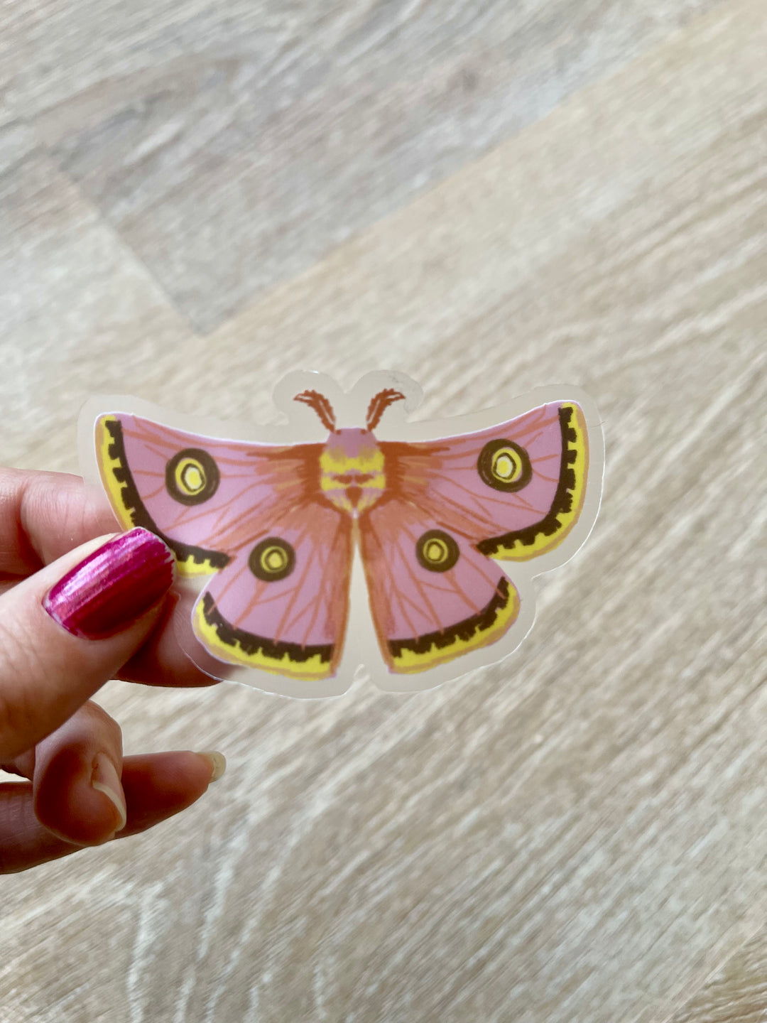 Pink moth waterproof clear vinyl sticker 3.0 x 1.7"